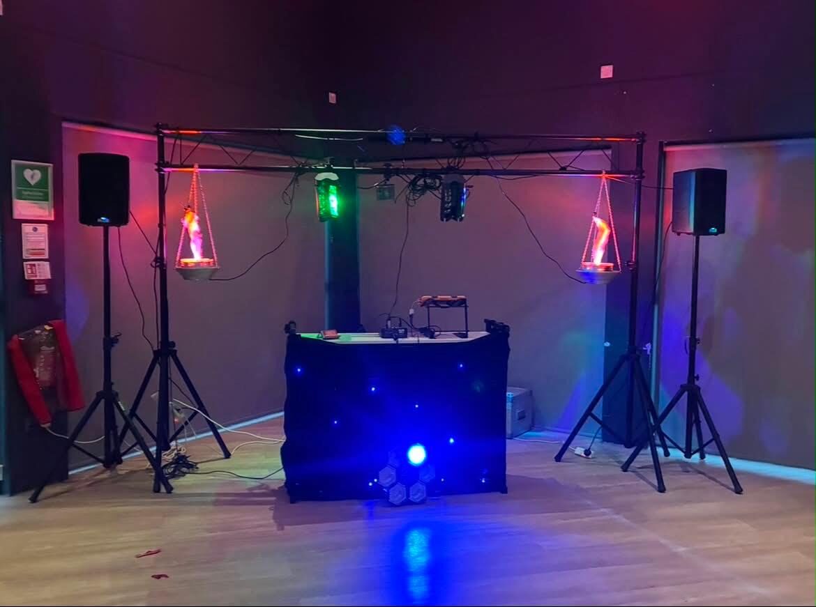 Disco lighting rig and speakers set up in a function hall