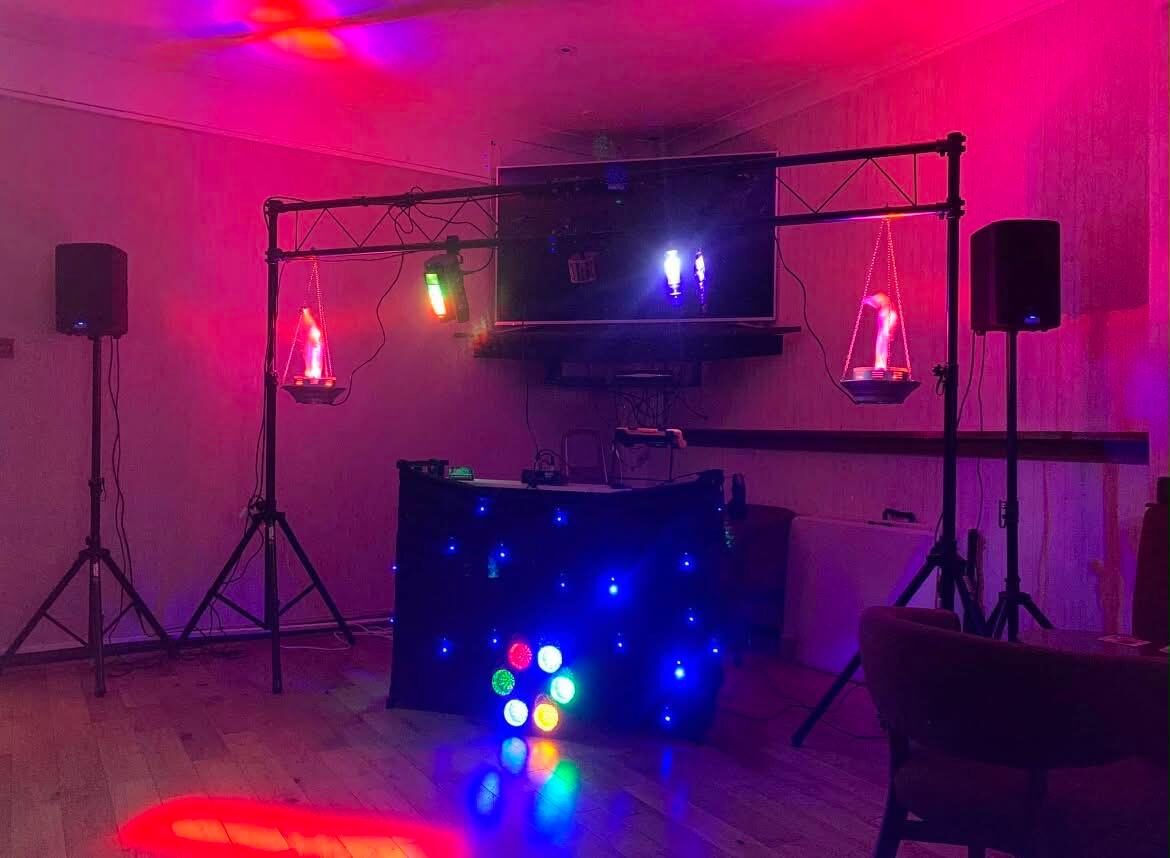 Full disco rig with truss lighting and speakers ready for a party